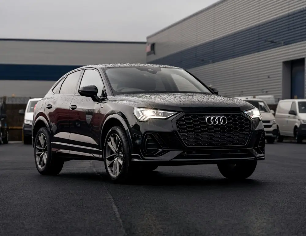 Black Audi Q3 in a carpark