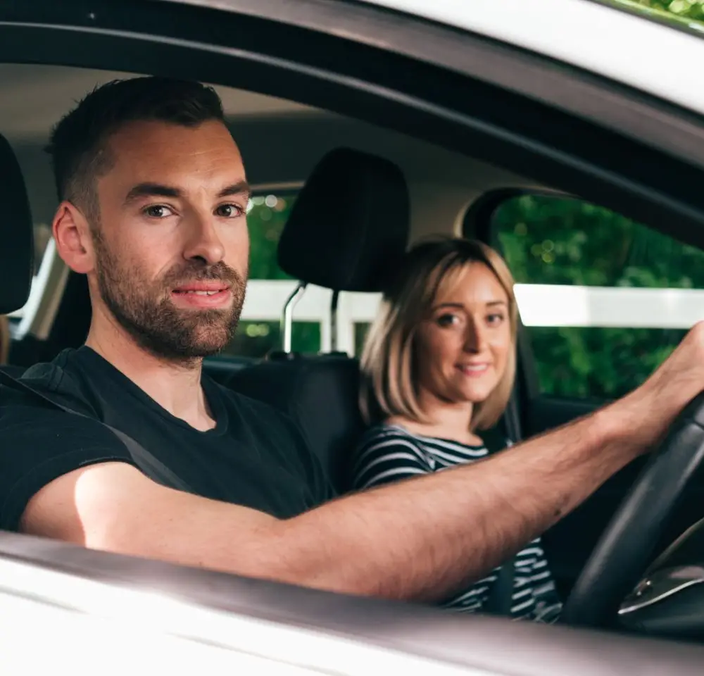 Happy Couple in a car